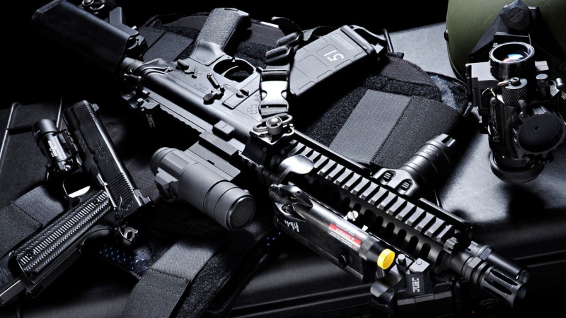 no people, gun, photography themes, high angle view, arts culture and entertainment, AR-15, black color, camera - photographic equipment, communication