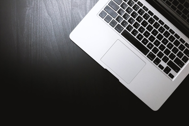 wireless technology, table, high angle view, black, copy space, no people, computer key, silver colored, notebook, hardware, keyboard, indoors, blank, computer