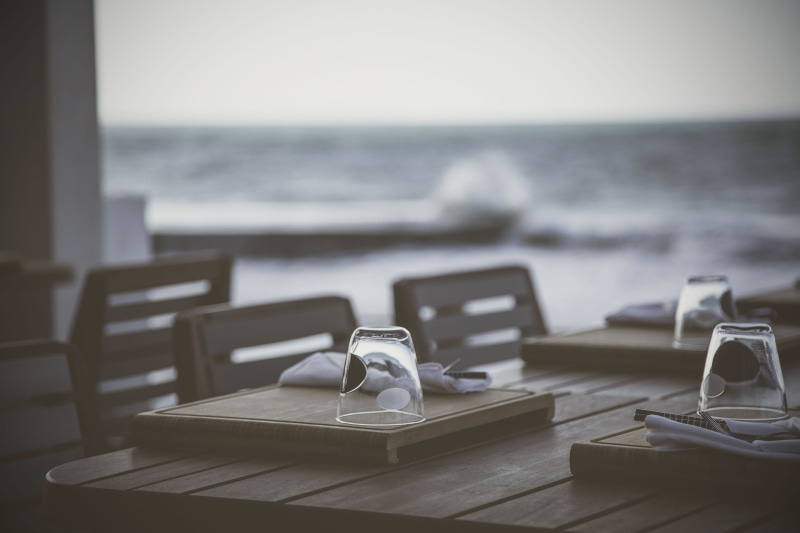 table, flipped, horizon over water, dining table, plywood, shoe, chair, focus on foreground, text, bowl, brown, tray, diamond, jewelry, focus, apparel