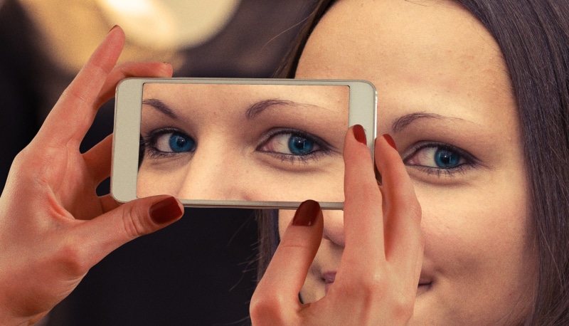 close-up, phone, double, deception, 2K, adult, virtual, eyebrow, one person, portrait, watching, view, woman, third eye, philosophy, illusion, beautiful woman