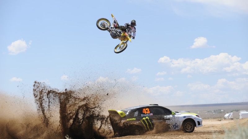 sky, yellow, real people, sports, joy, leisure activity, stunt, one person, mid-air, skill, coupe, dirt, bike, land vehicle, men, mode of transportation