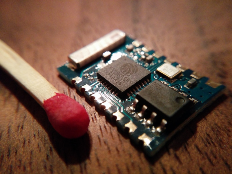 computer equipment, mother board, esp8266, circuit board, table, close-up, focus on foreground, chip, connection, electronics industry, metal, high angle view