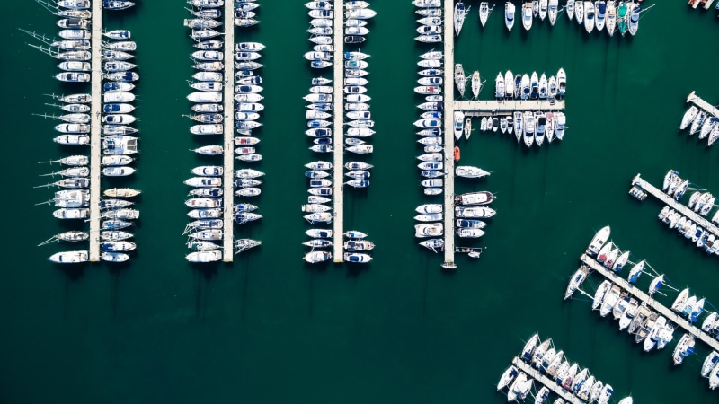 large group of objects, turquoise colored, building exterior, near, eye, close-up, s, mode of transportation, nature, built structure, boats, computer Chip