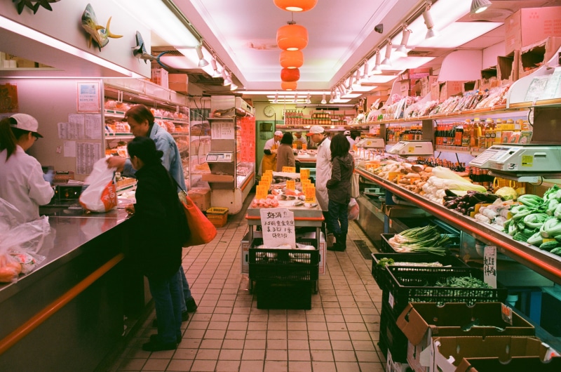 stands, beside, consumerism, women, shopping, front, 2K, store, buying, market, group of people, business, customer, people, supermarket, man, sale, food