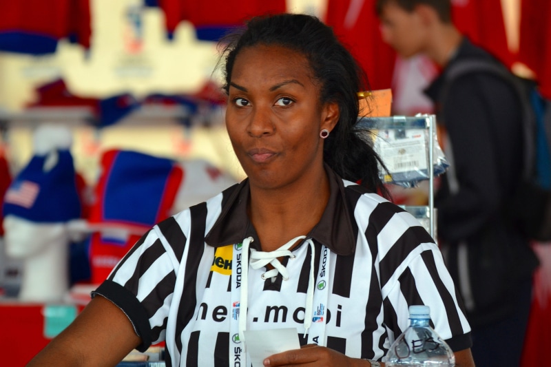 referee, waist up, two people, women, leisure activity, people, the cashier, adult, lifestyles, front view, portrait, young women, flag, standing, young adult