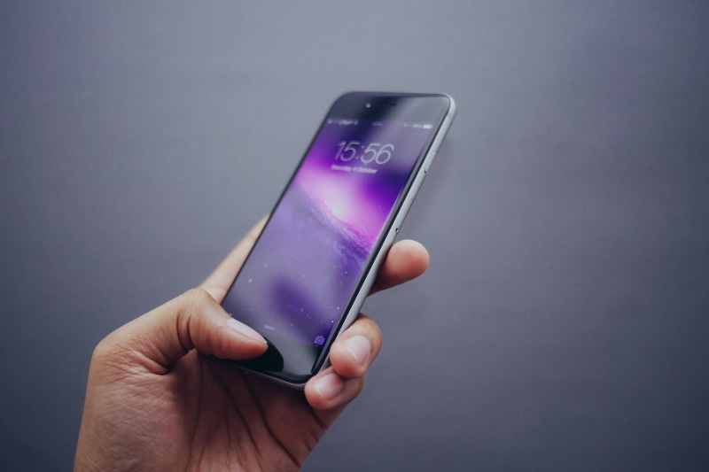 smartphone, gray, people, connection, using phone, person, communication, human hand, human body part, surface, studio shot, technology, mobile, one person