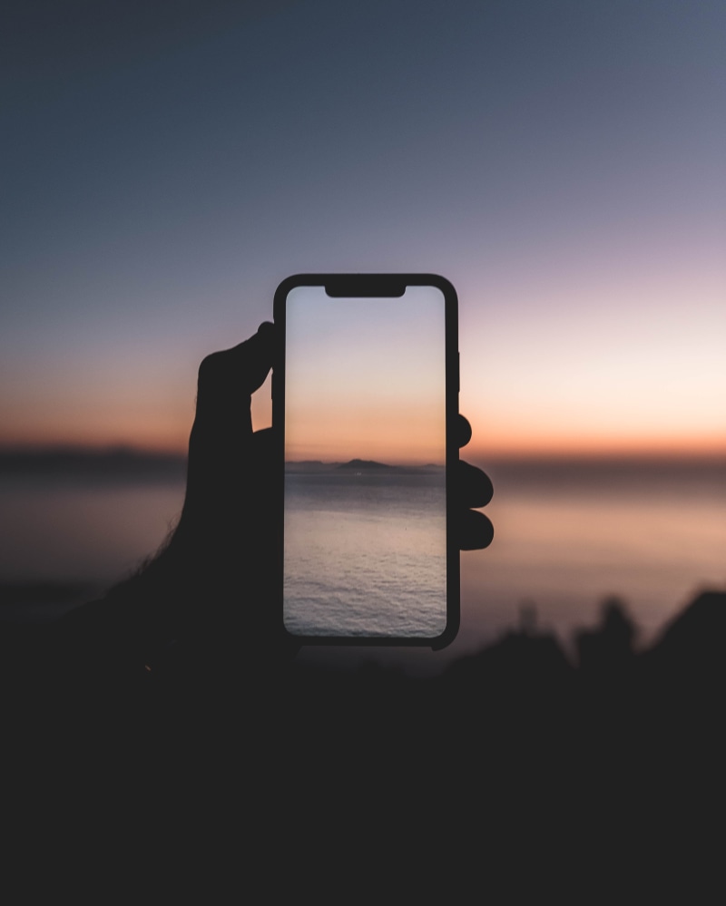 horizon, landscape, phone, outdoors, water, hold, sunset, blur, coast, beach, human Hand, sunrise, cloud - Sky, backgrounds, depth of field, vacations