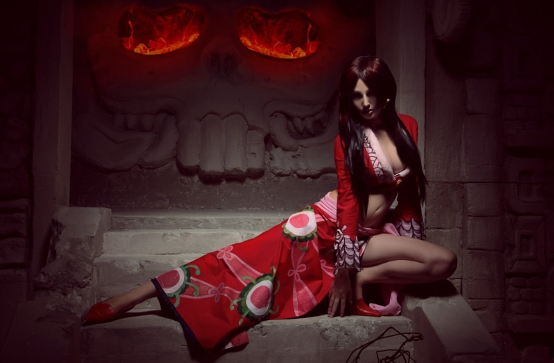 Women, red, boa, One Piece, sitting, dress, one person, lifestyles, real people, young adult, contemplation, adult, indoors, costume, full length, clothing