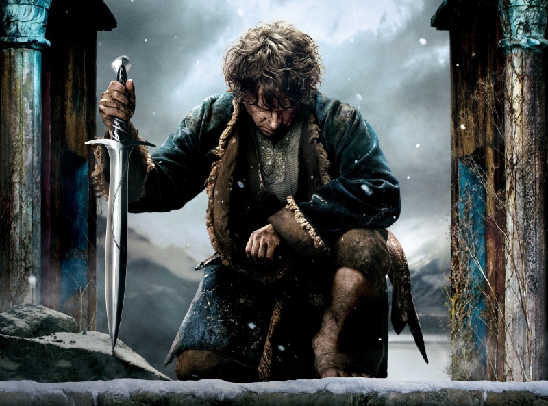 warm clothing, armies, The Hobbit, Bilbo, holding, men, one person, Movies, full length, 2014, clothing, leather, leisure activity, lifestyles, five, snow