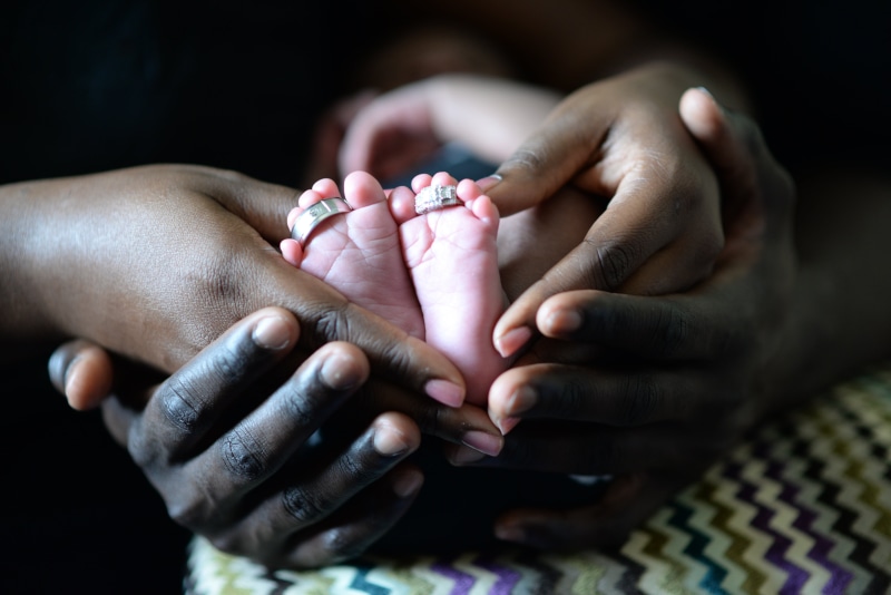 young, couple, persons, two people, emotion, mother baby, women, child, father baby, care, maternity, adults, baby, fingernail, mum, hand, happiness, indoors