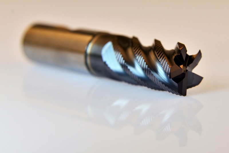 machining, shadow, milling cutters, roughing end milling cutters, cnc, selective focus, still life, creativity, education, steel, no people, office, end mill