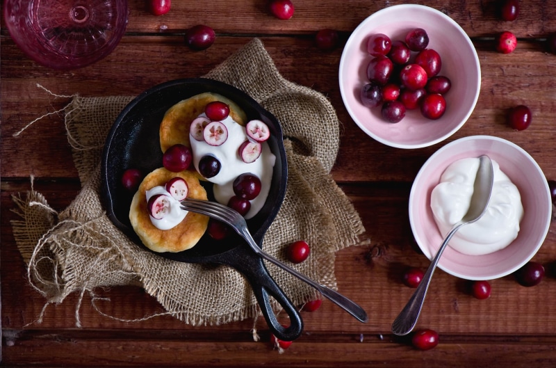 still life, directly above, table, wellbeing, kitchen utensil, spoon, no people, wood - material, pancakes, freshness, sour cream, high angle view, indoors