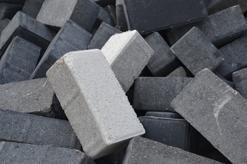 no people, wheel, cube, close-up, rock, concrete, road, full frame, backgrounds, architecture, pile, metal industry, cement, computer, pavement, stone