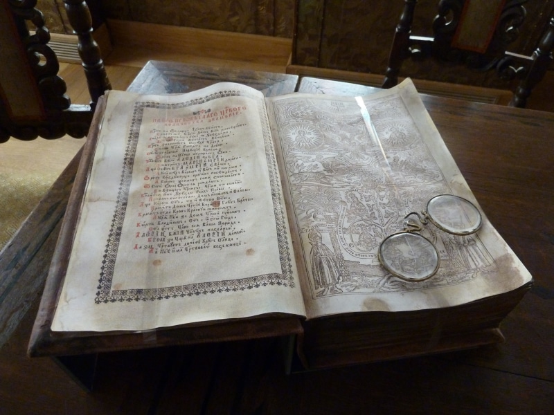 table, education, learning, religion, text, the past, reading, historic, study, book, antique, old, wood - material, literature, high angle view, page
