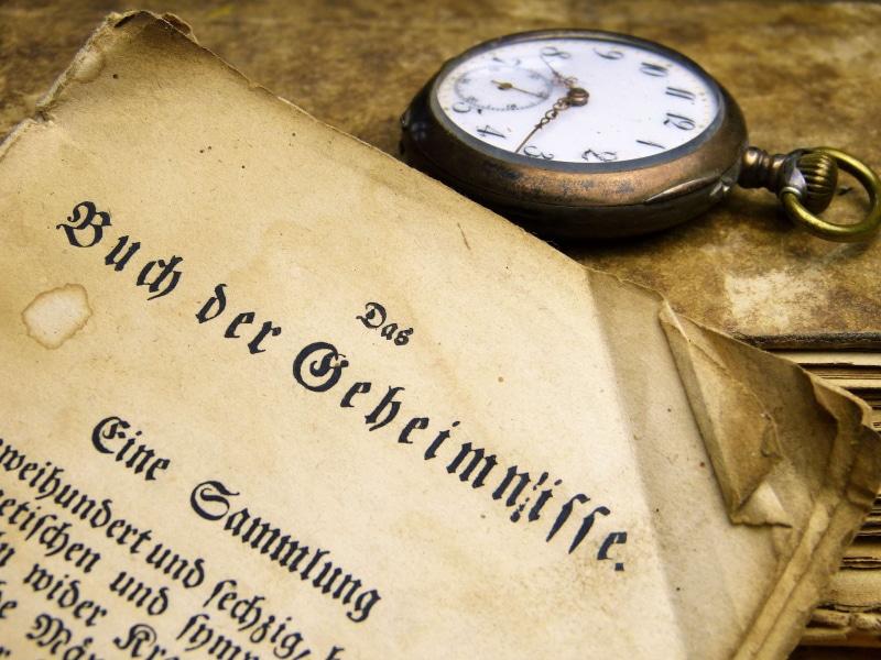 sign, school, close-up, pocket watch, page, learn, read, book, secret, antique, study, document, newspaper, time, business, text, age, communication, literature