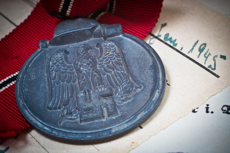 calligraphy, wealth, paper, currency, communication, history, single object, finance, historically, high angle view, soldier, representation, world war ii