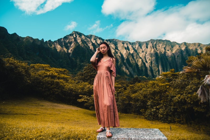 5K, mountain, nature, clothing, standing, facing camera, trees, day, hair, adult, outdoors, beautiful woman, sky, portrait, time, green, women, woman