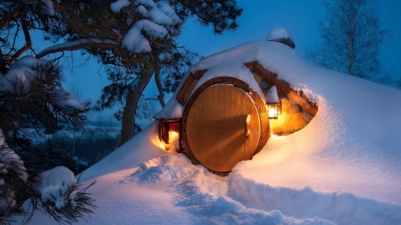evening, light, outdoors, hobbit hole, hobbiton movie set, tree, winter, snowcapped mountain, matamata, snowy, hobbiton, frozen, illuminated, movie location