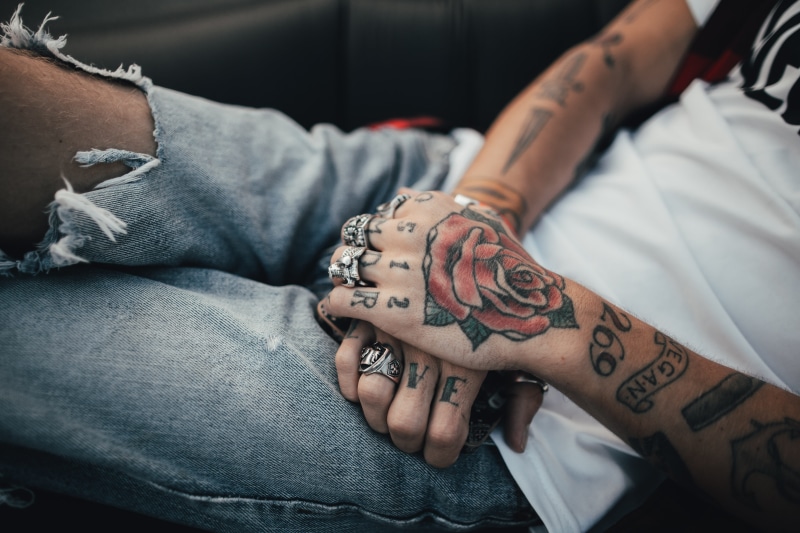 two people, 5K, human limb, man, rose, holding, hand, ripped, s, tatoo, person, focus on foreground, creativity, midsection, body adornment, paint, jamakassi