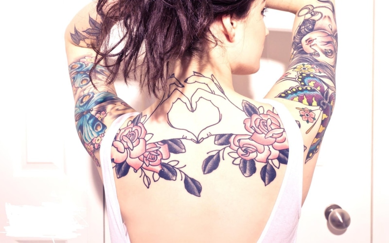 floral pattern, hairstyle, women, beautiful woman, one person, human hand, real people, tattoo, young women, young adult, indoors, adult, midsection, women tattoos back