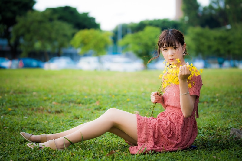 flowers, sitting, 1080P, women outdoors, model, Asian, depth of field, looking at viewer, brunette, sandals, women, pink dress