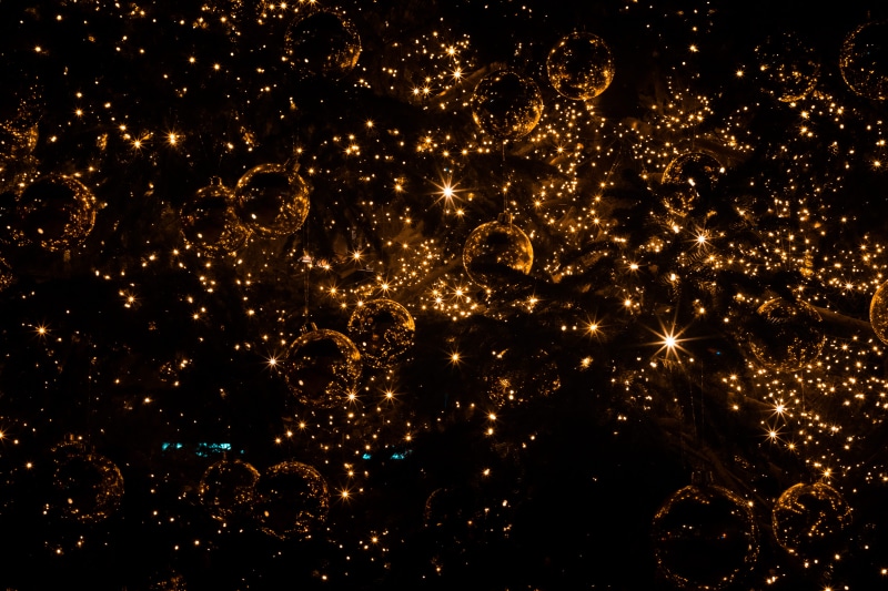 decor, gold, arts culture and entertainment, colors, black background, luminosity, firework - man made object, outdoors, ornament, glitter, firework display