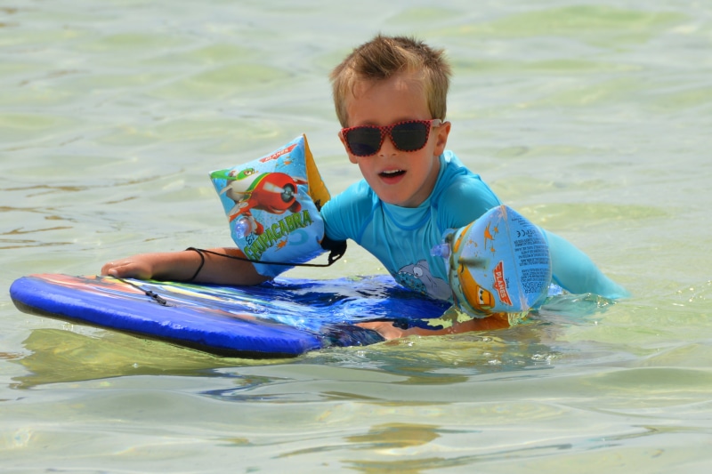 childhood, one person, leisure activity, swimming, eyewear, waterfront, uv protection, inflatable, 4K, child, straps, holding, men, boys, real people