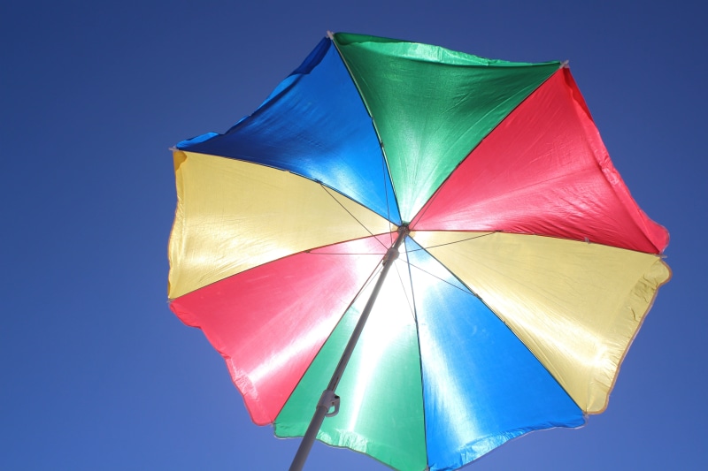 clear sky, sky, multi colored, no people, outdoors, green, blue sky, purple, color, nature, sunlight, uv radiation, parasol, safety, close-up, low angle view
