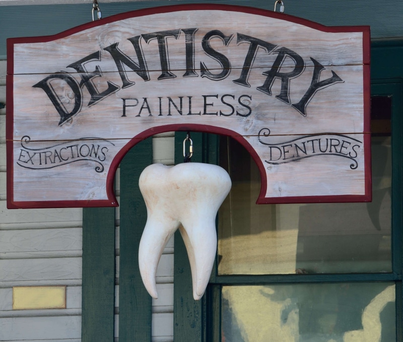 wall - building feature, logo, medical, signage, information sign, graffiti, disease, clean, message, no people, profession, dentist, close-up, business