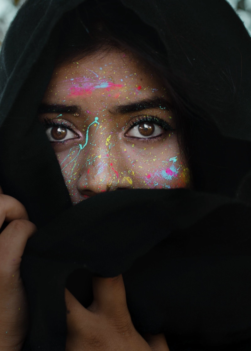 one person, meaning, clothing, big eyes, looking at camera, person, human, covering, close-up, hood, human face, looking, model, apparel, veil, face, face paint