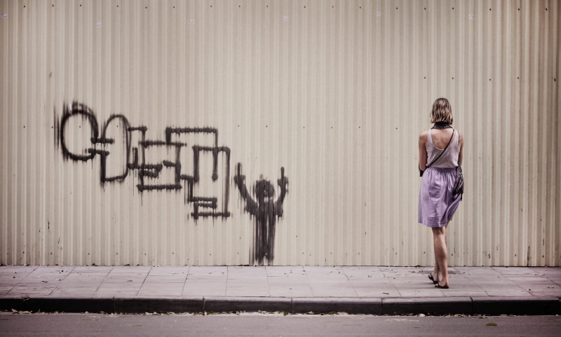 4K, real people, one person, female, building exterior, tank, shoe, mini skirt, architecture, street, wall - building feature, clothing, wall, young adult