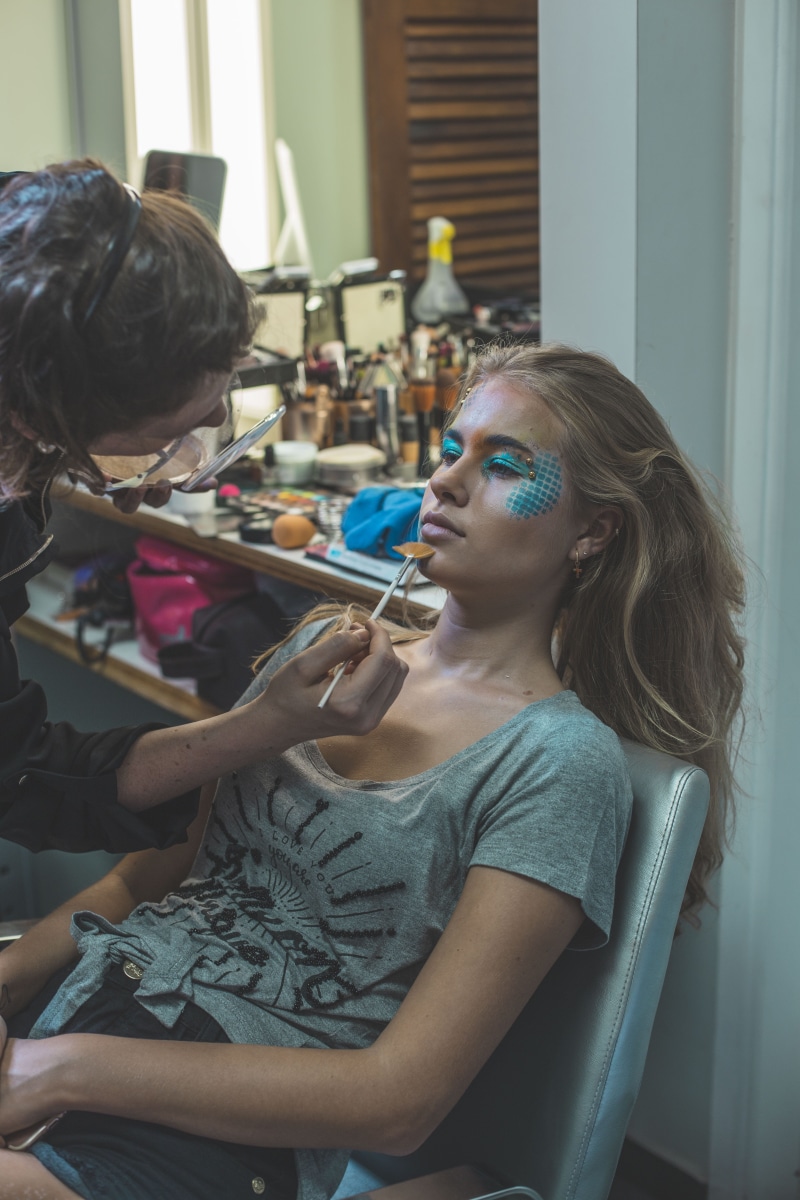 make-up, adult, innocence, close-up, paitning, blond hair, young adult, child, make up brush, focus on foreground, youth, blue, lips, two people, holding