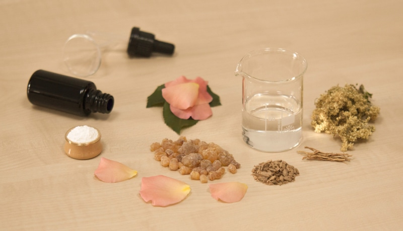 homeopathic medicine, studio shot, 4K, vetiver, chrysopogon zizanioides, miron violet glass, aromatherapy, meadowsweet, food and drink, top note, base note