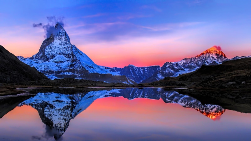 beauty in nature, idyllic, scenic, winter, ice, scenics - nature, no people, snowcapped mountain, forest, sun, symmetry, snow, cloud - sky, mountain peak
