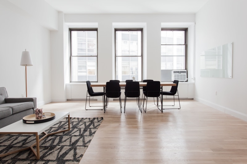 indoors, glass - material, center, wall, window, hardwood floor, couch, carpet, living room, office chair, business, day, home interior, modern, chair