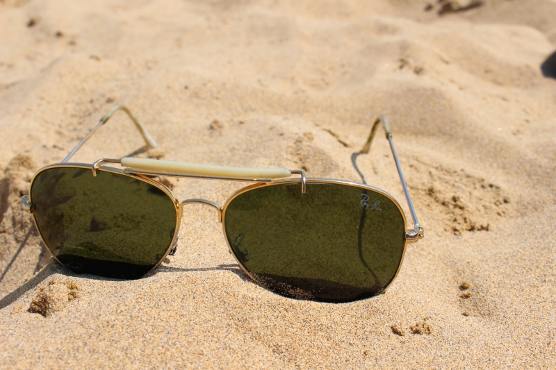 sand, eyeglasses, land, eyesight, fashion, recovery, eyewear, sunglasses, leisure, nature, security, holiday, focus on foreground, still life, beach, no people