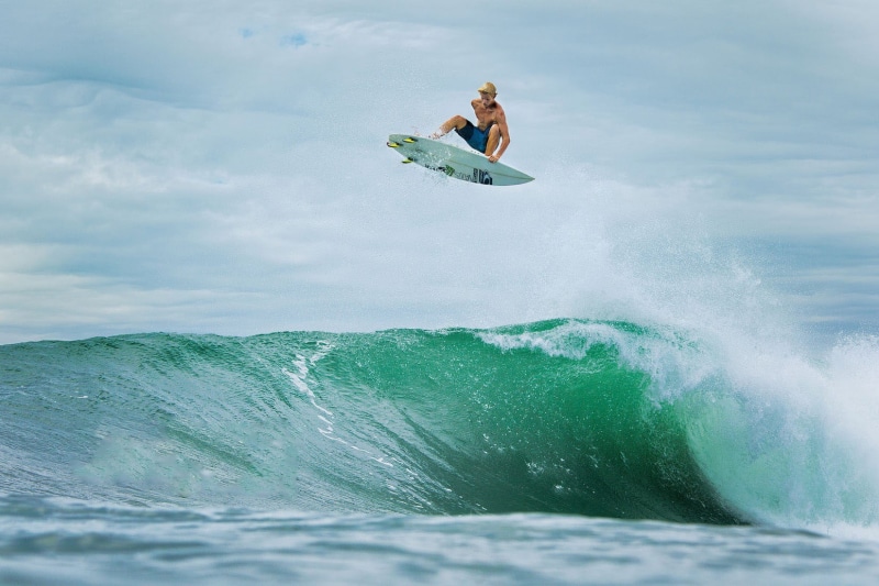 positive emotion, water, fun, full length, extreme sports, men, adventure, vacations, surfboard, outdoors, white, mid-air, waves, John Florence, one person
