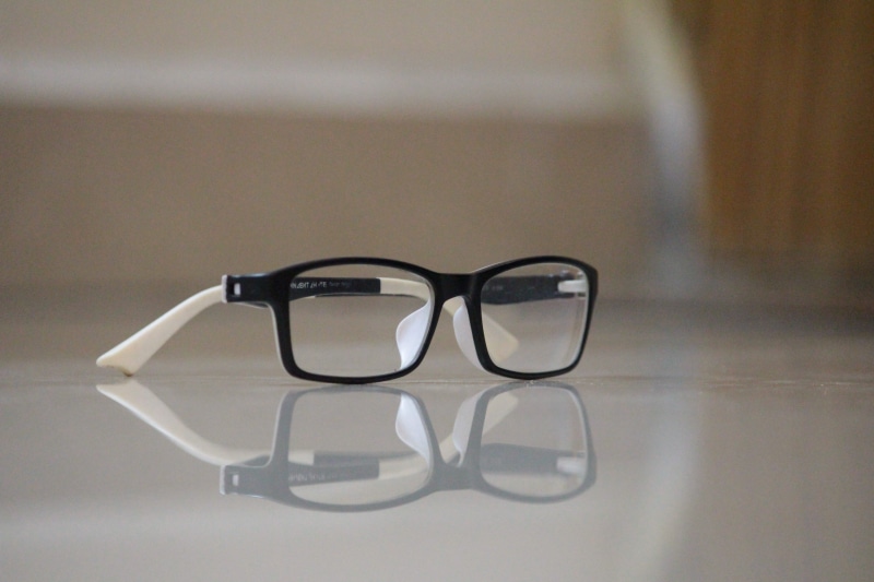 black color, Reflection, close-up, no people, black, white, simplicity, surface, eye, eyeglasses, Glass, optical, table, transparent, Spec, personal accessory