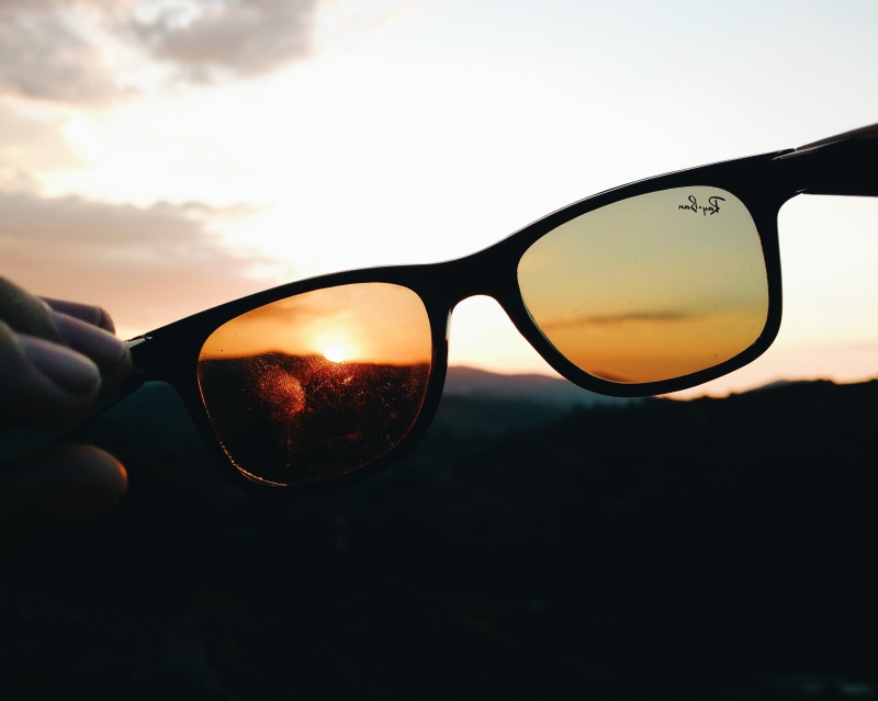 one person, eyeglasses, horn rimmed glasses, glass - material, s, brown, wayfarer, close-up, reflection, day, eyesight, point, sun, real people, yellow