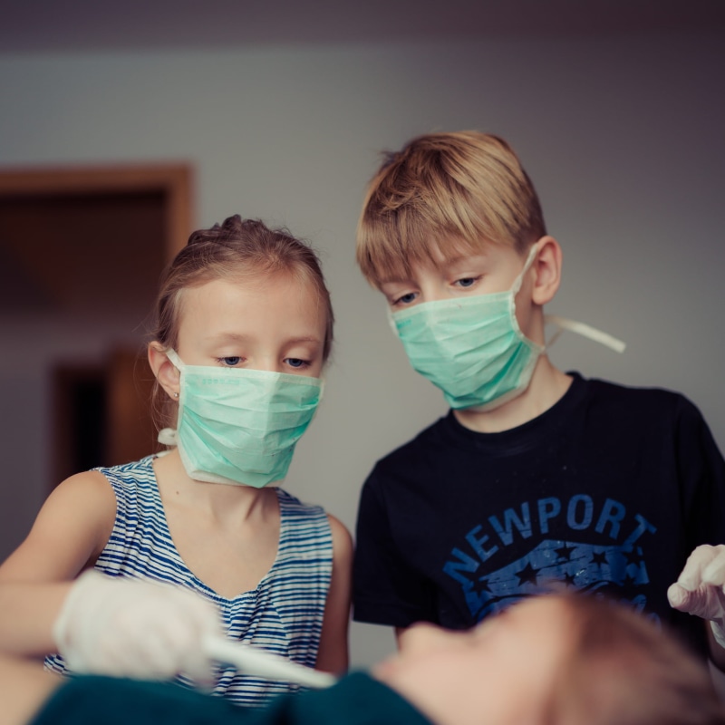 front view, males, kids, brother, home interior, cute, education, boy, innocence, togetherness, surgical, people, wearing, two, childhood, girl, fun, real people