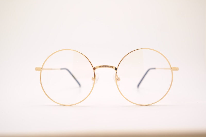 retro styled, no people, copy space, gold, togetherness, eyewear, circle, glasses, glasses glass, indoors, close-up, luxury, personal accessory, cut out