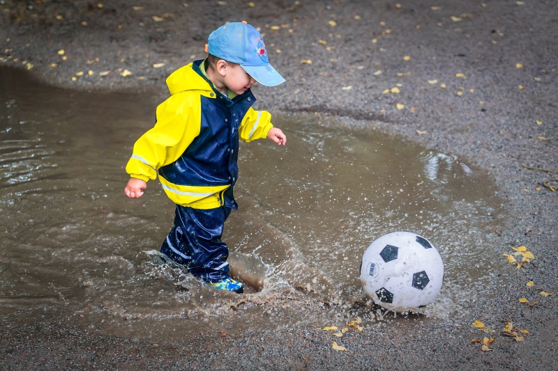 healthy, rubber, kid, drops, water, full length, happy kid, ball, puddle, casual clothing, people, jumping, offspring, happy, rain, child, sports equipment