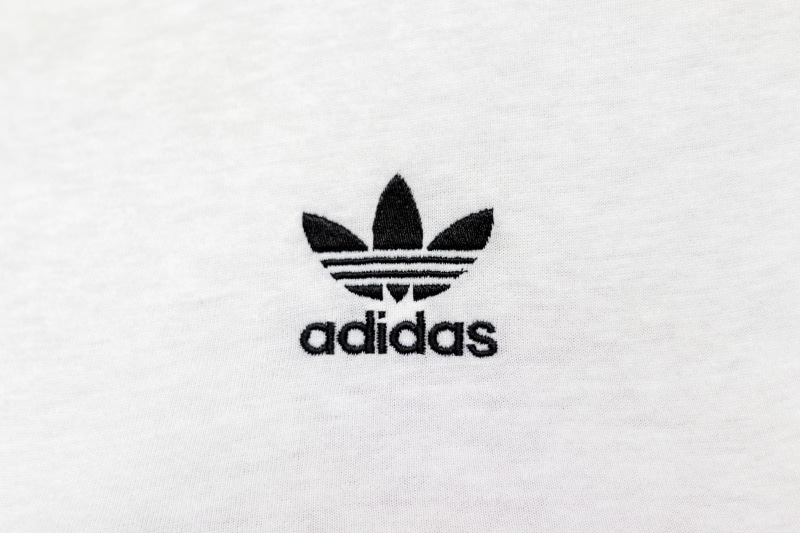 copy space, logo, communication, close-up, western script, capital letter, vehicle, transportation, text, adidas brand, still life, minimal, fashion, product shot