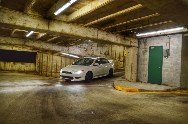 built structure, indoors, lighting equipment, Mitsubishi Lancer Evolution, warehouse, illuminated, domestic room, motor vehicle, ceiling, no people, garage
