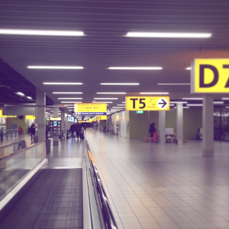 travel, illuminated, mode of transportation, flooring, tiled floor, transportation, airport, fluorescent light, amsterdam, sign, subway station, modern