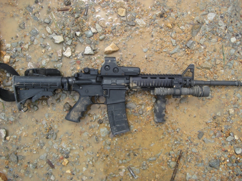 military, fighting, armed forces, aiming, conflict, weapon, stones, government, gun, outdoors, machinery, black, sleeve, rifle, communication, day, protection