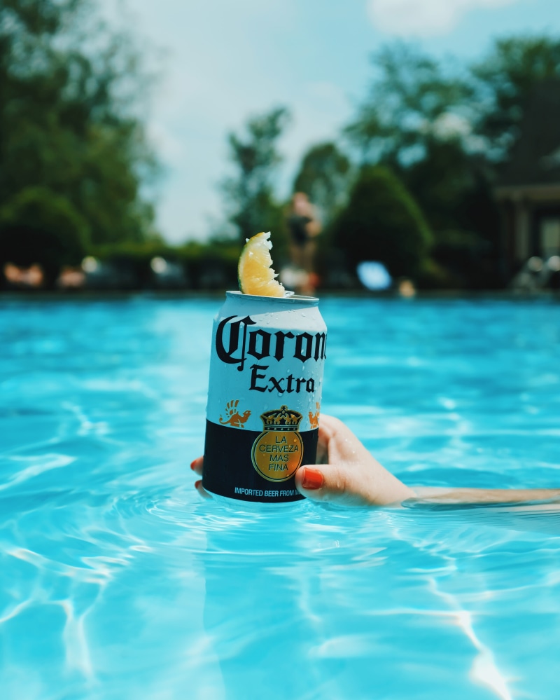 fashion, beer, drink, can, food and drink, swimming, aurora, night, heat, outdoors, focus on foreground, nature, corona, lifestyles, lime, day, beverage