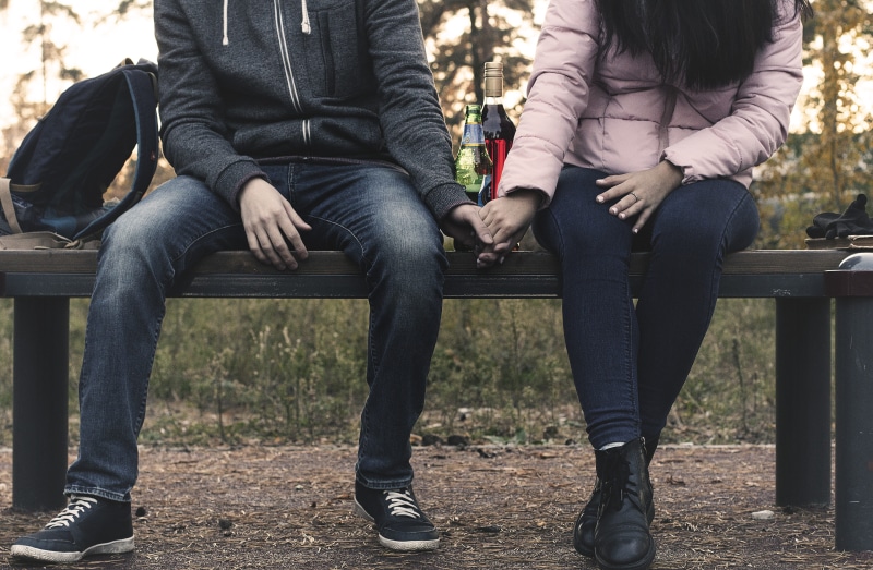 love, female alcoholism, positive emotion, girl, quarrel, casual clothing, stress, drunkenness, sadness, guy, glass bottle, bench, on the bench, sitting