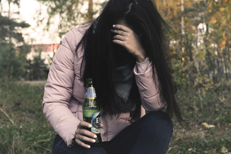alcohol, drunkard, one person, girl, alcoholic, sadness, booze, alcoholism, on the street, dependent, with a bottle, bottle, real people, land, glass, plant