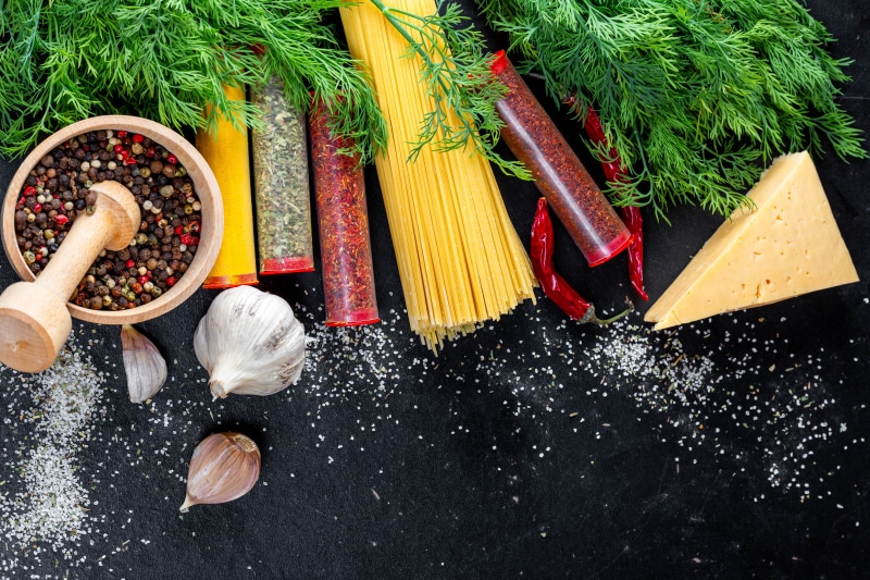 jars, table, greens, spices, cheese, spaghetti, food, cooking, the mixture of peppers, pepper, pasta, dill, 5K, mortar, the dark background, Chile, garlic